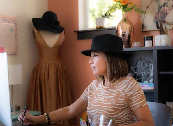 Female entrepreneur working in her office